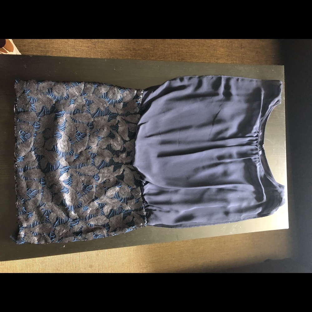 Aidan Maddox dark blue dress with sequins.